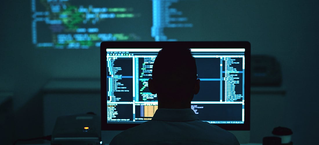 A man working at a computer in Costa Rica's technology industry