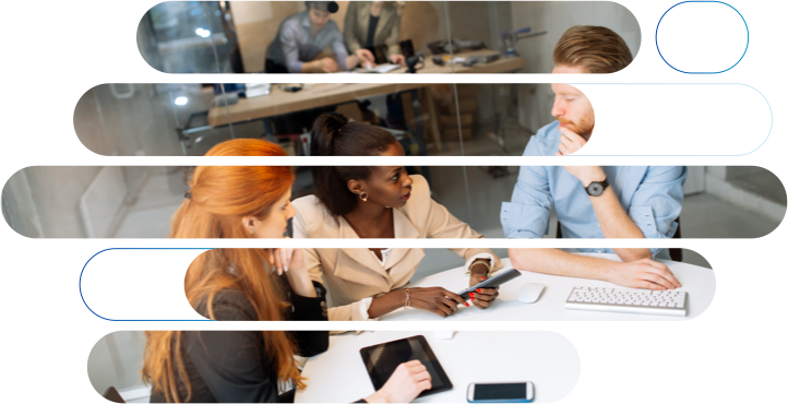 Three office workers sitting at a meeting